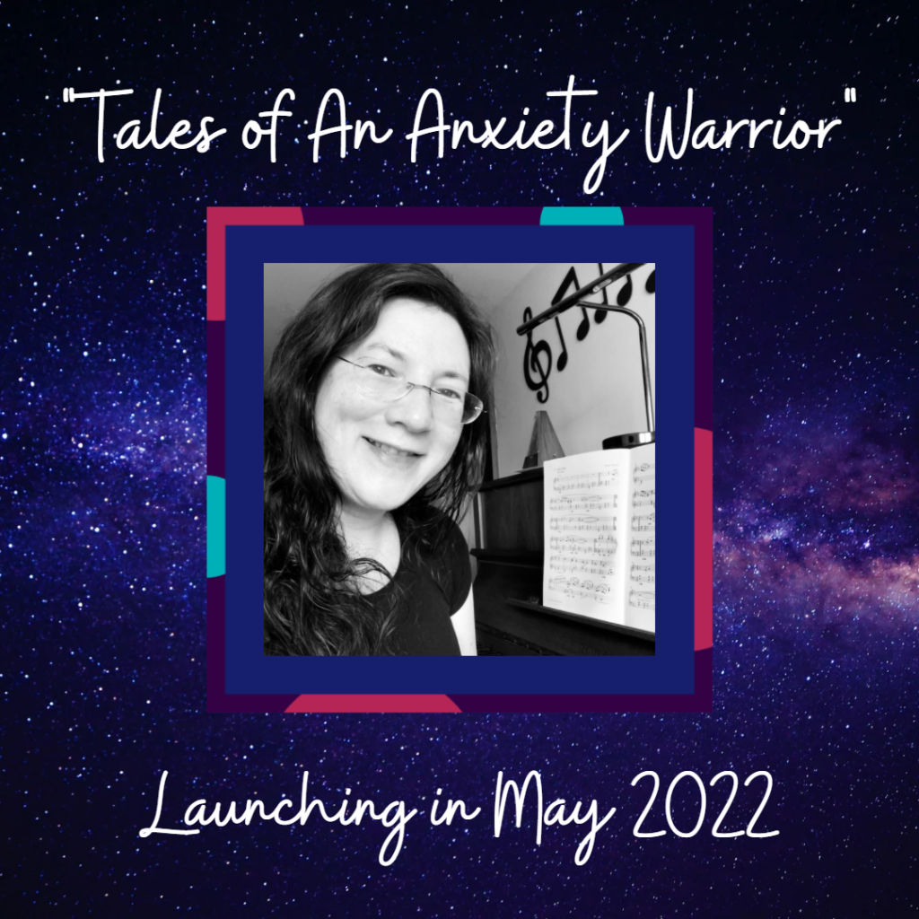"Tales of an Anxiety Warrior" launching in May 2022. A selfie of me at my piano in black and white in the centre, with a galaxy background. Year of the Tiger, I am a Tiger!