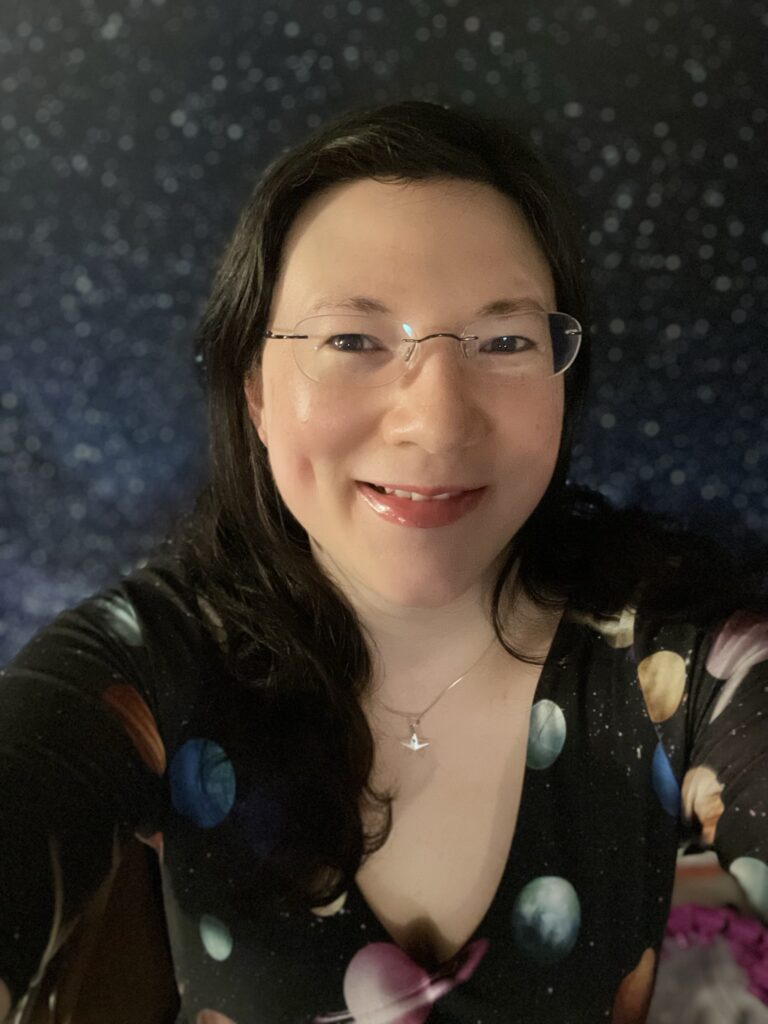 Full Steam Ahead! Tales of an Anxiety Warrior is coming soon! 11 A selfie of me in my space themed dress, galaxy background