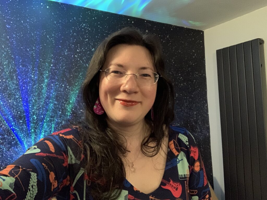 Full Steam Ahead! Tales of an Anxiety Warrior is coming soon! 6 A selfie of me in my musical instrument dress, galaxy background