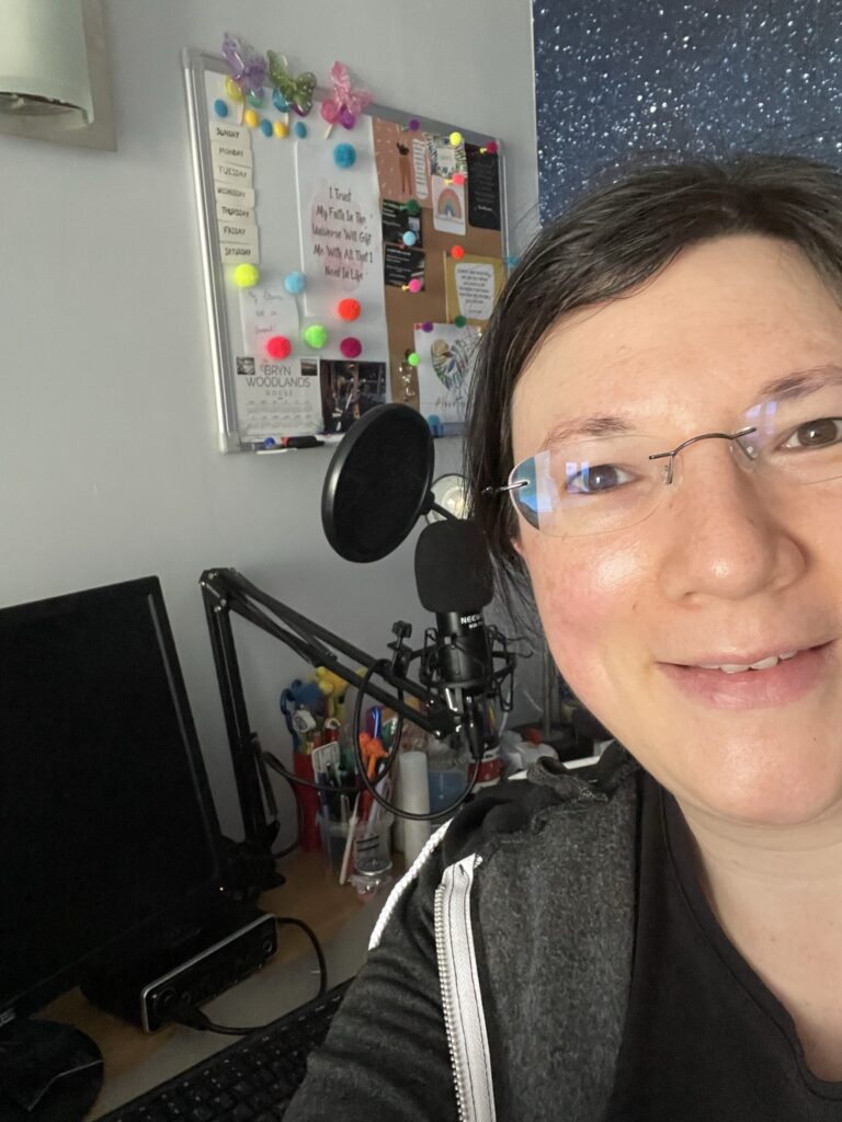 Launching My Awesome Podcast - World Mental Health Day 2022. 3 A seflie of me with my podcast setup in the background.