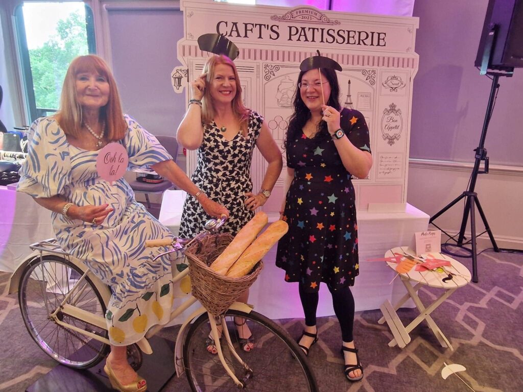 Summer Fun Begins! 4 Sue France, Fay Evans and myself posing for a picture with a bicycle, some props and some baguettes!