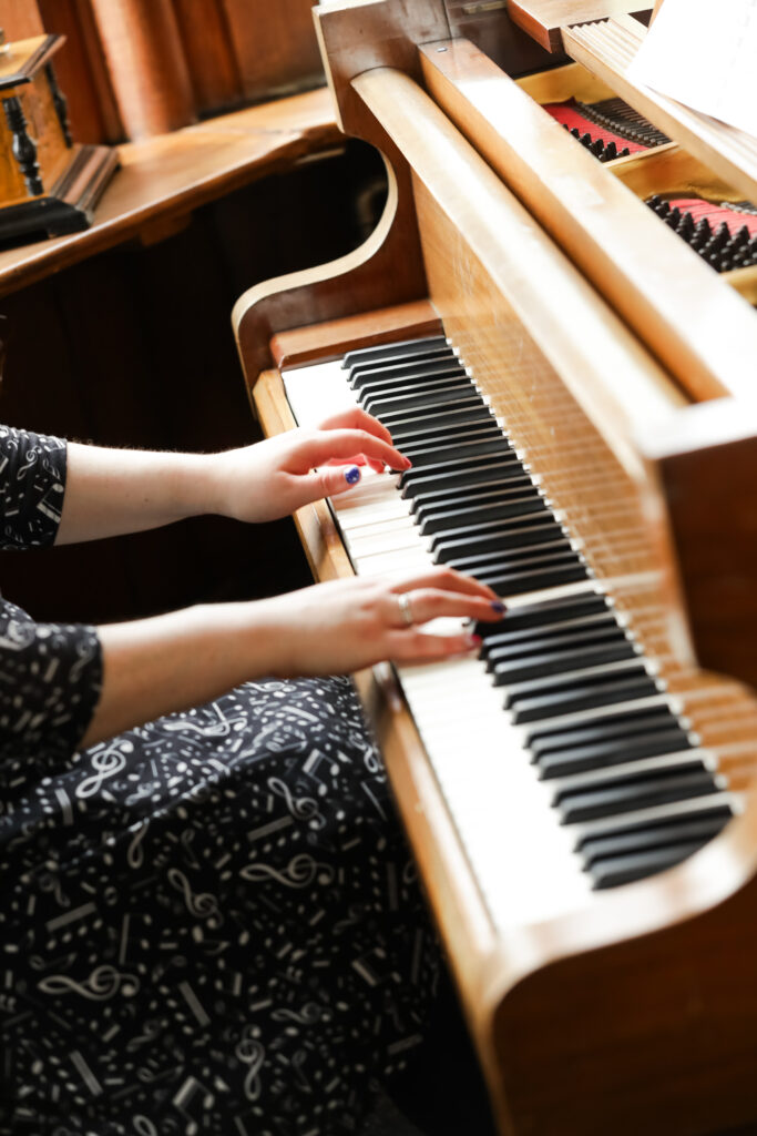 I had a Brand Photoshoot and it was so much fun! 4 a photo of my arms at the chateau rhianfa piano