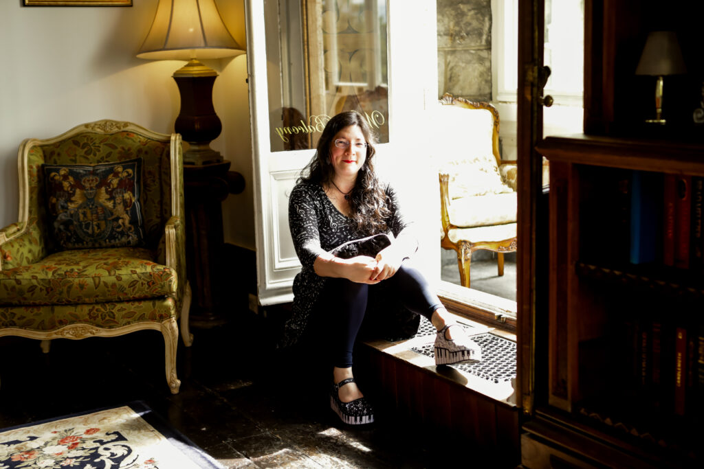 I had a Brand Photoshoot and it was so much fun! 14 a photo of me sat on the sill by the window