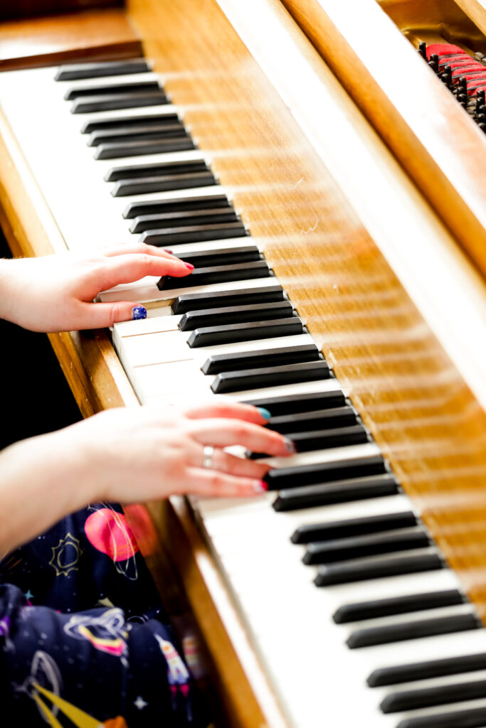 I had a Brand Photoshoot and it was so much fun! 17 a photo of my hands playing the piano