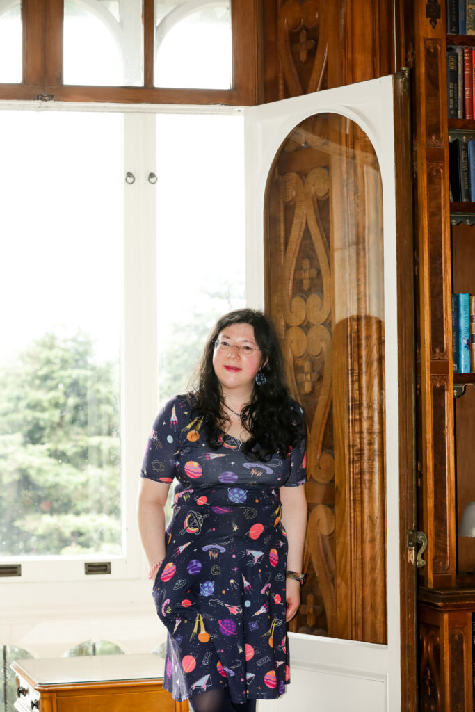 I had a Brand Photoshoot and it was so much fun! 20 a photo of me leaning against the window frame