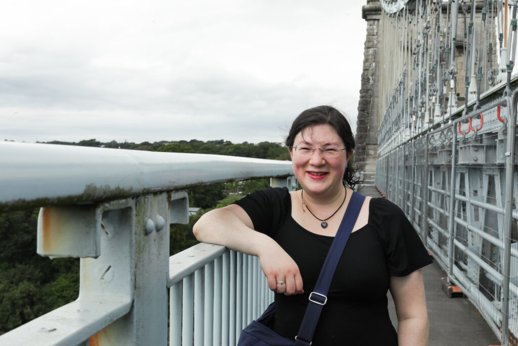 I had a Brand Photoshoot and it was so much fun! 30 a photo of me leaning against the menai bridge