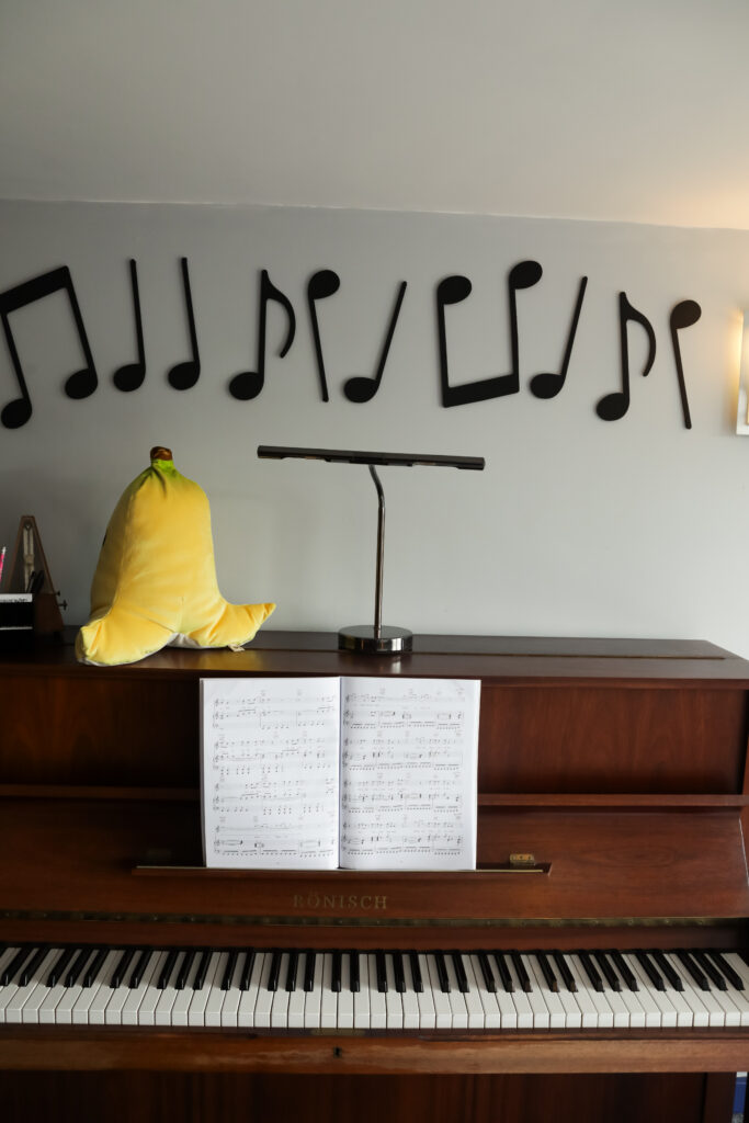 I had a Brand Photoshoot and it was so much fun! 43 The banana is facing the wrong way! There's a big banana plush sat on top of my piano.