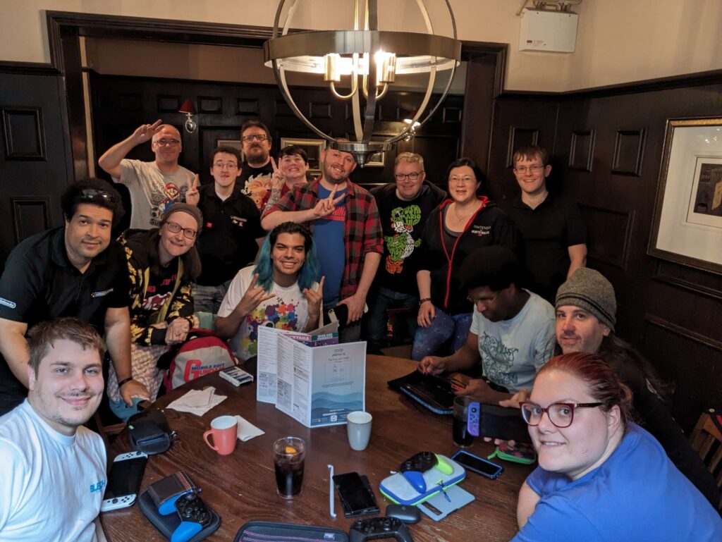 A whole group photo of the 15 of us, smiling at the camera.