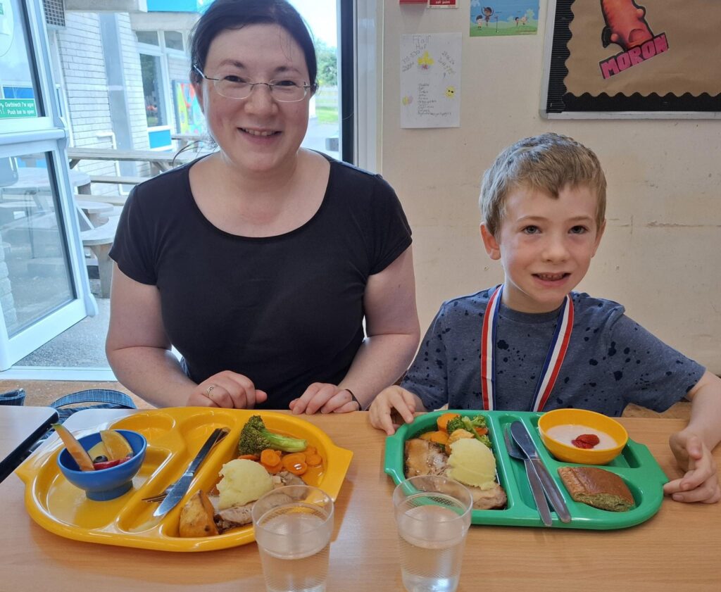 Making the most of the Summer Holidays 2024! 7 A picture of me and my son enjoying lunch at the "food and fun" club