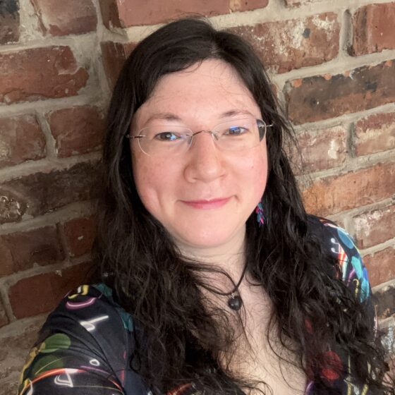 a selfie of me in a musical popsy dress, at the literary lunch