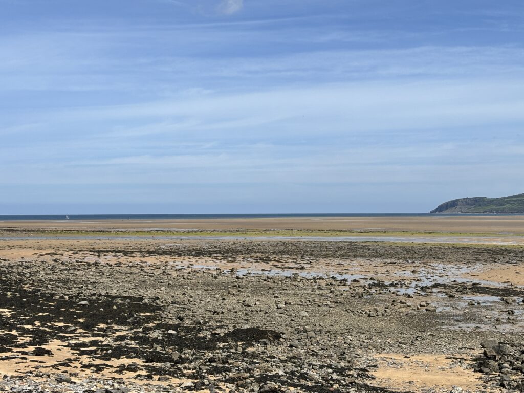 Summer has Started here, Exciting plans ahead! 10 benllech beach at low tide on a sunny day