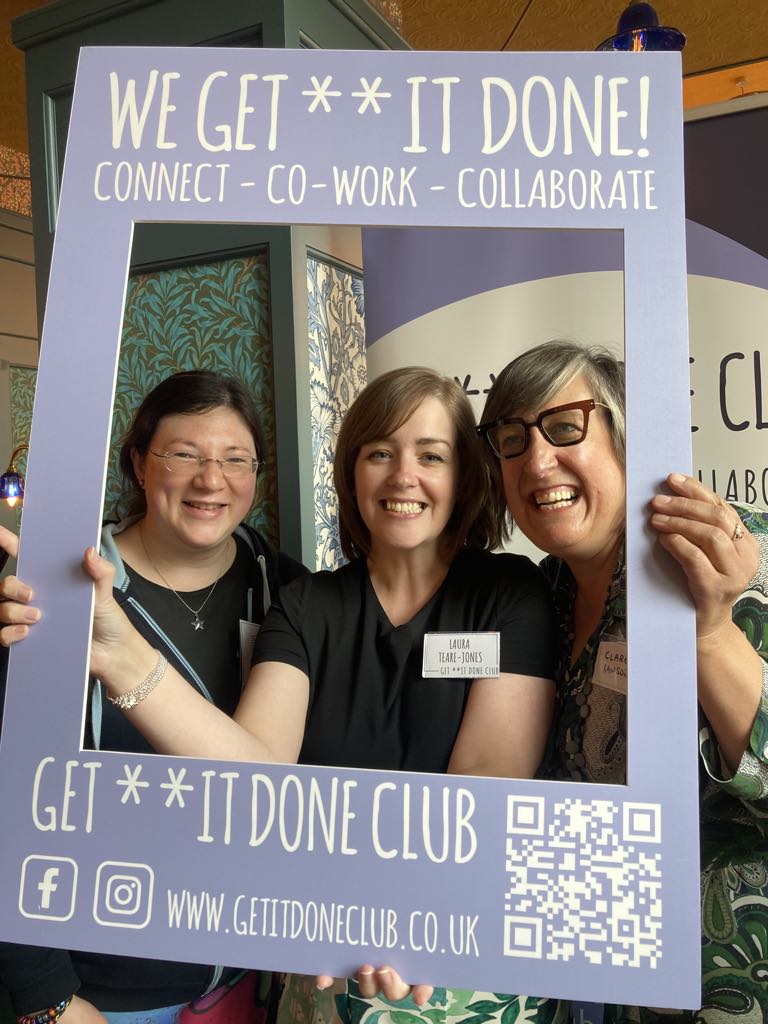 Summer has Started here, Exciting plans ahead! 15 me, host Laura, and Claire posing for a photo behind the "Get **it done" frame.