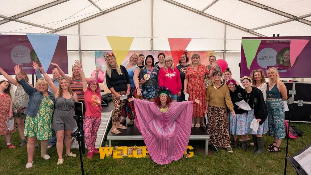 Festivals of 2025 Fulfilled & 3 Public Speaking Goals Smashed! 5 snapshot of the group picture of some of the choir, with Sophie front and central, and I'm at the back in the middle.
