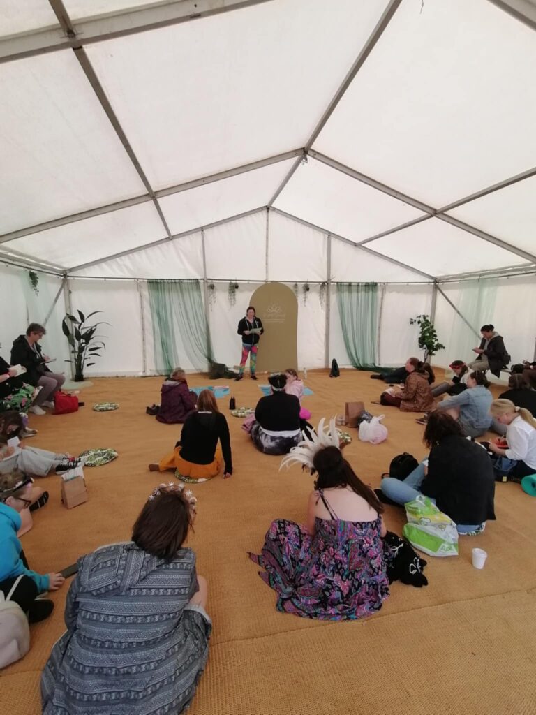 Festivals of 2025 Fulfilled & 3 Public Speaking Goals Smashed! 16 public speaking : The full tent of people sat watching my workshop, with me facing the audience in the background.