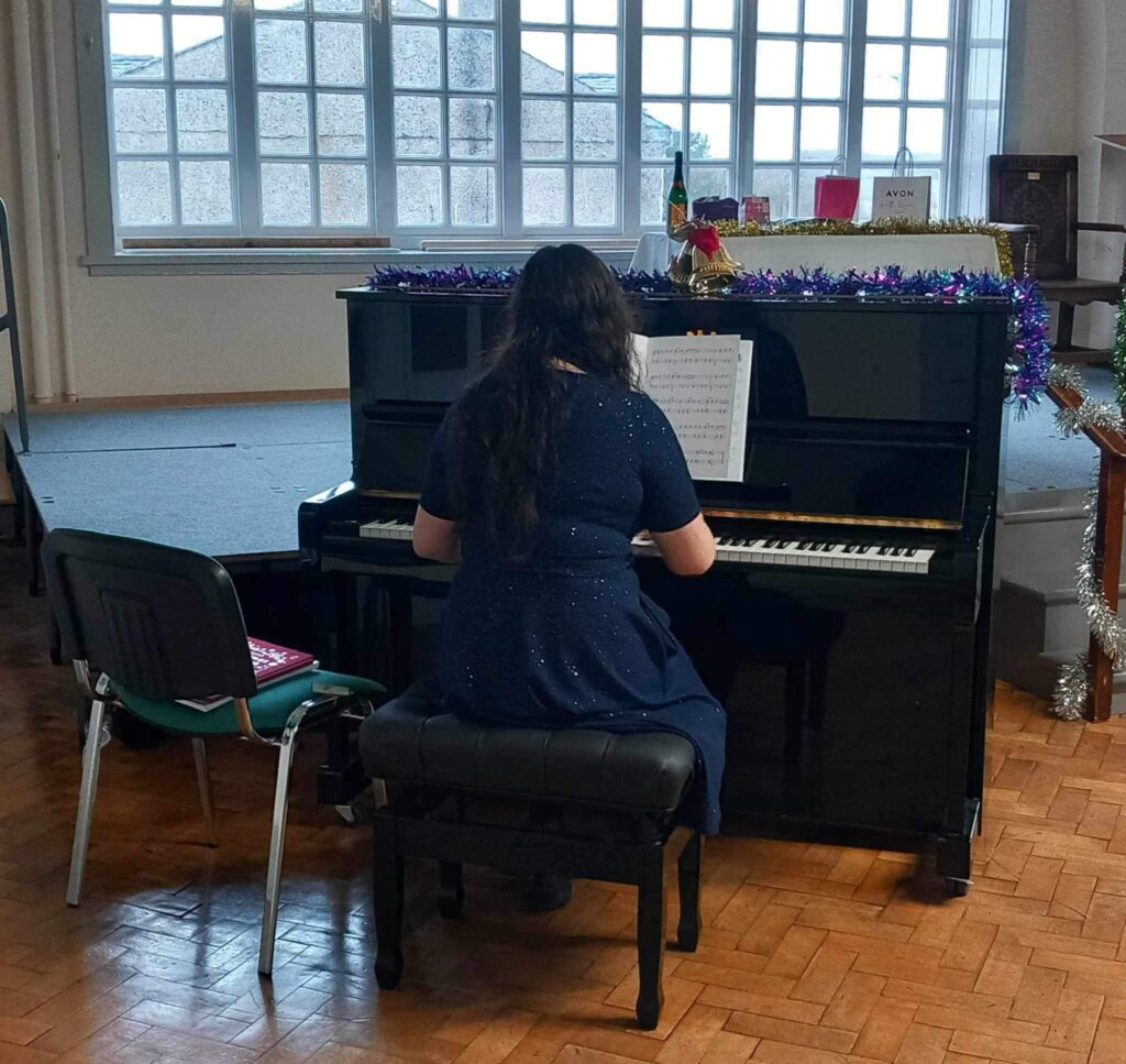 A Level Results, a 20+ year old Memory of Failure... 5 photo of my playing my first in person Christmas concert 2023