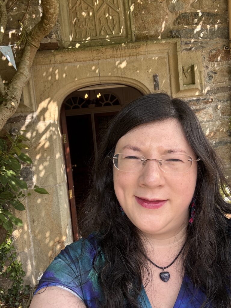 2025: Niching Down... With Powerful Intention! 5 A selfie outside the wedding venue I played at in August 2025