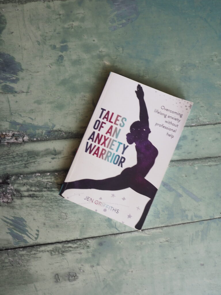 A Spontaneous Adventure to Learn Photography..! (and the Power of Networking) 10 My book imposed on a turquoise plank flatlay