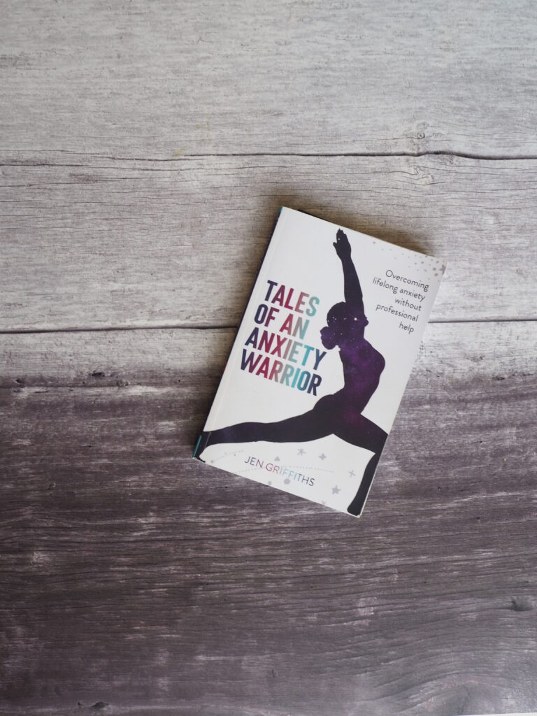 A Spontaneous Adventure to Learn Photography..! (and the Power of Networking) 8 My book on a flatlay which is whitewash at the top, fading into a dark grey.