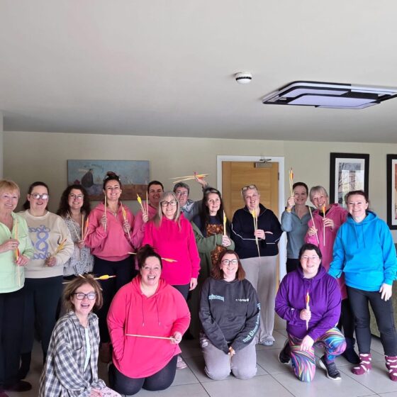 a group photo of all the ladies who attended the retreat for IWD.