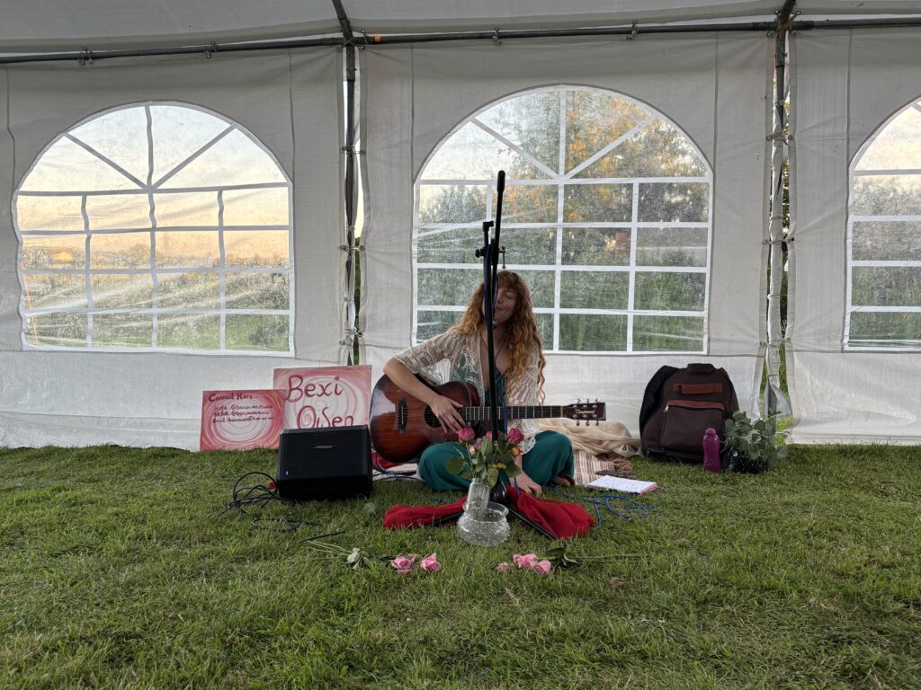 Summer 2026 is a Great Balance! 4 Bexi Owen performing her evening set during sunset. Balance for a day of activities!